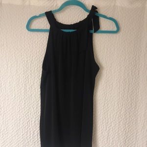 Tank with bow tie strap